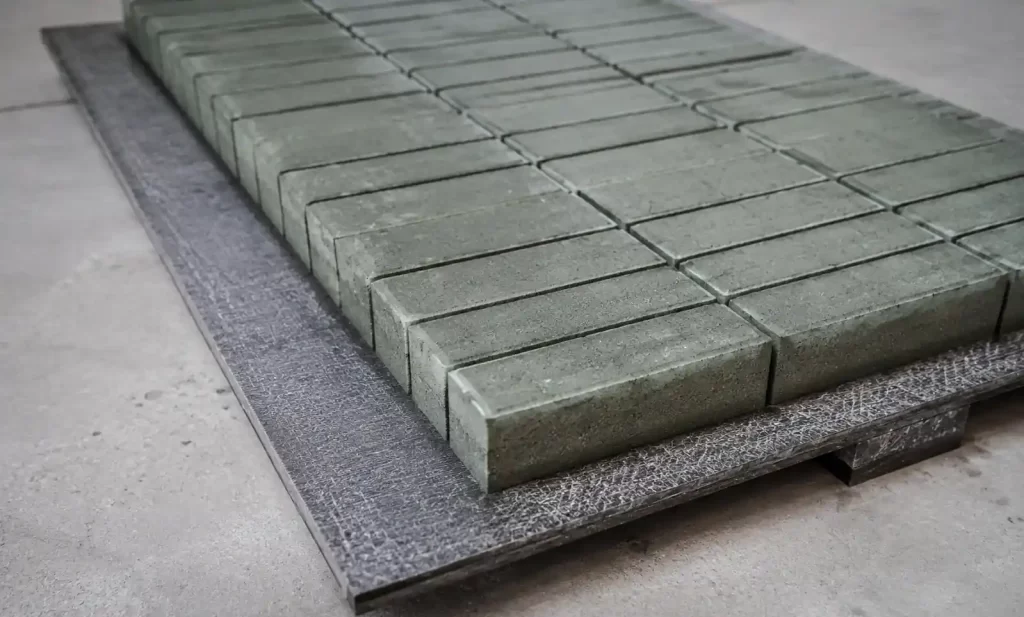 Close-up of GMT pallet flat surface supporting uniform brick arrangement