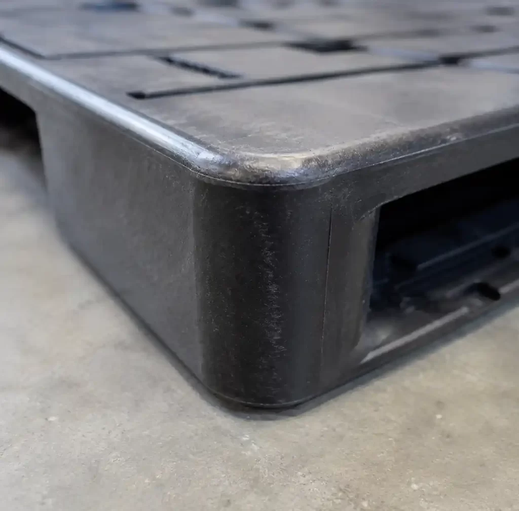 GMT pallet edge detail showing durable construction after extended use