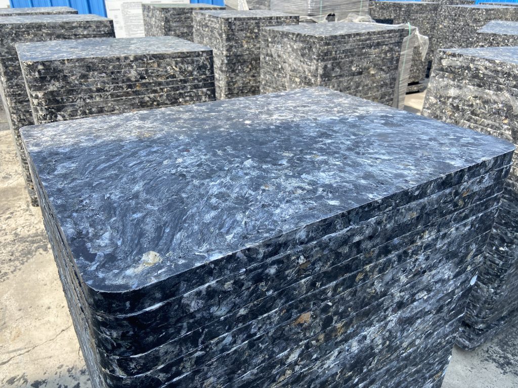 Forklift handling GMT brick pallet showing impact-resistant edge reinforcement