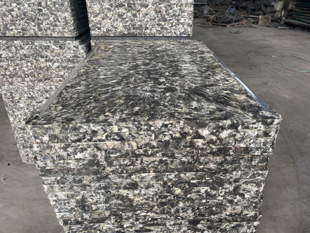 Close-up of GMT pallet surface texture and fiber reinforcement