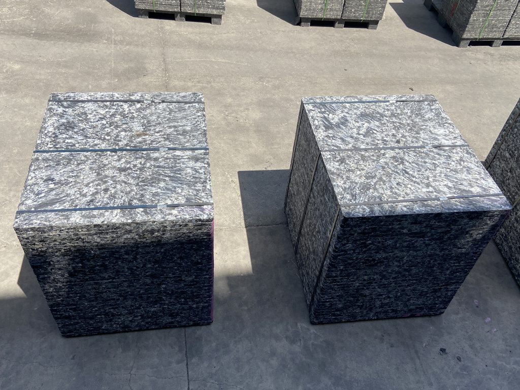 GMT glass fiber pallets in brick curing warehouse showing durability advantage