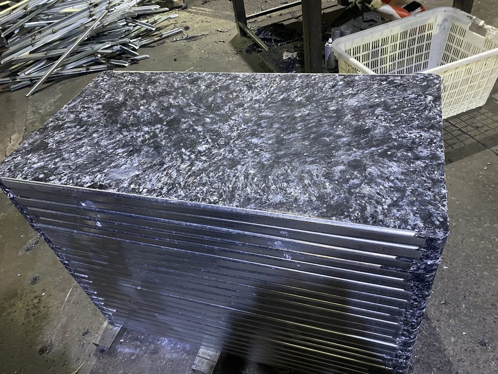 GMT glass fiber pallets in brick curing warehouse showing durability advantage