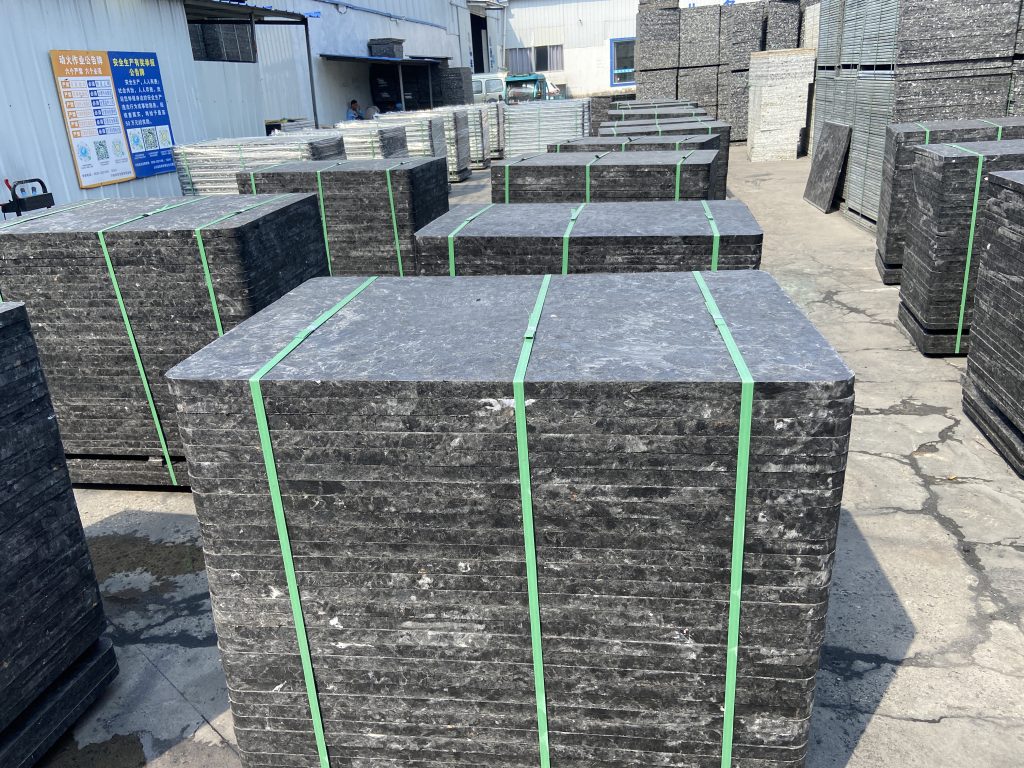 Shipping container loaded with GMT pallets showing freight weight advantage
