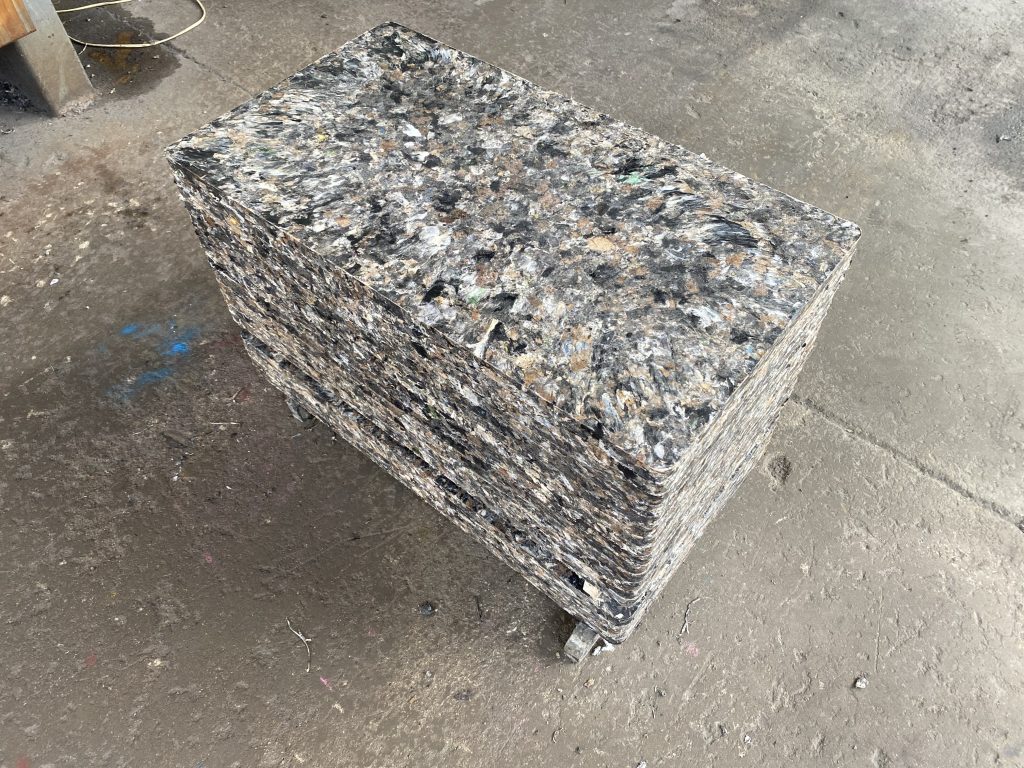 White-yellow dual layer GMT pallet showing compromise color option for brick manufacturing