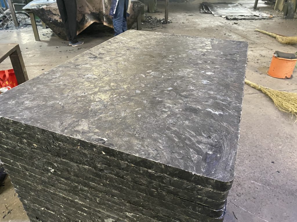 GMT pallet used in concrete block production showing heavy-duty application