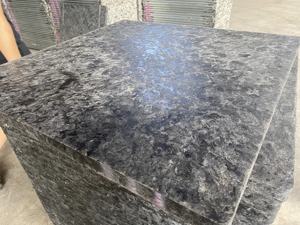 Close-up inspection of GMT brick pallet surface finish and quality