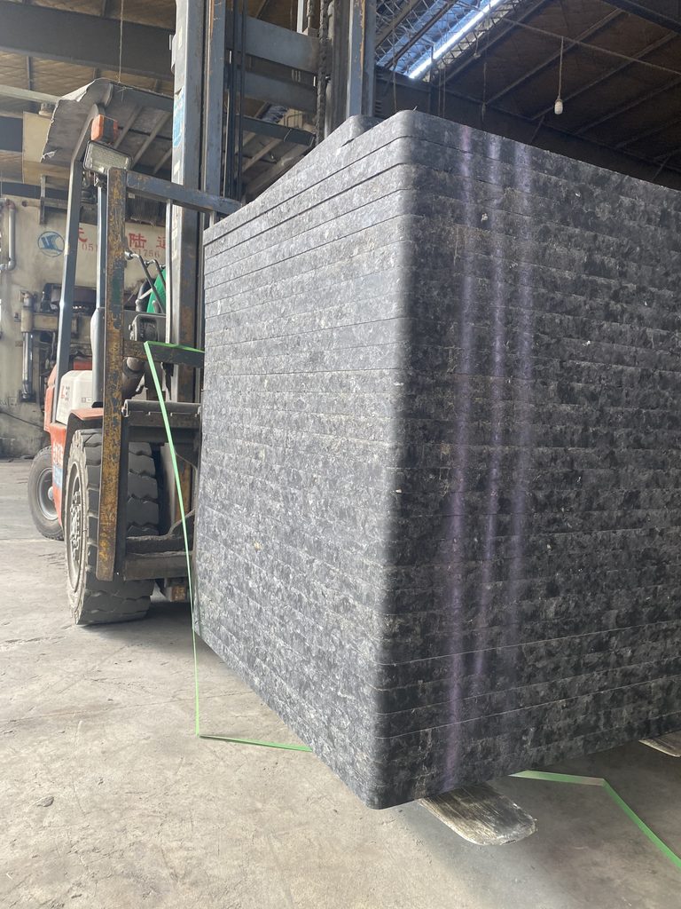 Glass fiber reinforced GMT pallet showing internal composite structure