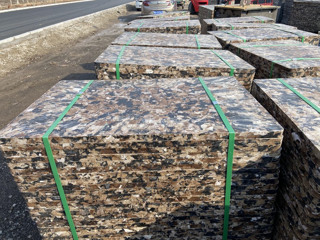 Comparison of GMT and wood pallet dimensional stability in extreme heat