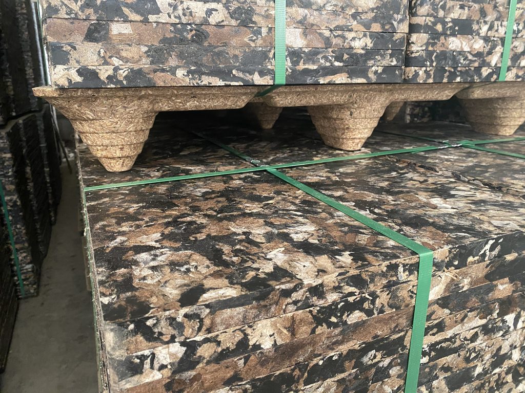 GMT brick pallets in outdoor curing yard withstanding daily temperature cycles and monsoon conditions